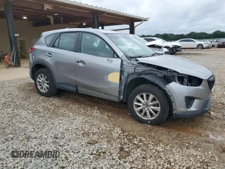 2015 Mazda CX-5 Sport z VIN JM3KE2BE4F0459532, wystawiony jako Copart lot #61049235 z przebiegiem 149 808 mil mil oraz Szkoda całkowita • Salvage title. Historia ofert i sprzedaży dostępna na DreamBid. Obrazek 4.