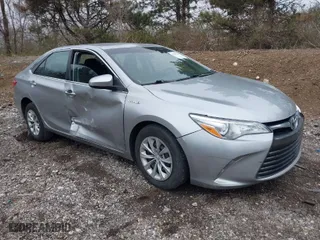 2015 Toyota Camry Hybrid LE with VIN 4T1BD1FK9FU161942, listed as a IAAI auction lot 41880622 with 216,632 mi miles. Bid and sale history available at carsss.com. Image 1.