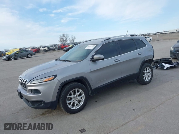2014 Jeep Cherokee Latitude z VIN 1C4PJMCS8EW230213, wystawiony jako IAAI lot #42011183 z przebiegiem 133 299 mil mil oraz . Historia ofert i sprzedaży dostępna na DreamBid. Obrazek 2.