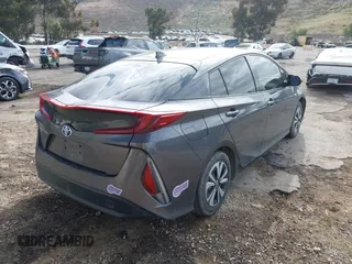 2018 Toyota Prius Plus with VIN JTDKARFPXJ3104302, listed as a IAAI auction lot 42127312 with 87,531 mi miles and . Bid and sale history available at DreamBid. Image 4.