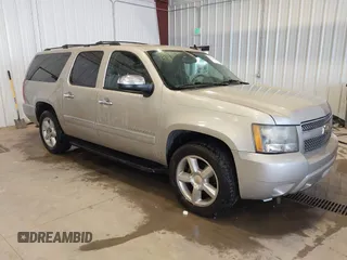 2009 Chevrolet Suburban LTZ with VIN 1GNFC36099R156290, listed as a IAAI auction lot 42508426 with 197,821 mi miles and . Bid and sale history available at DreamBid. Image 1.