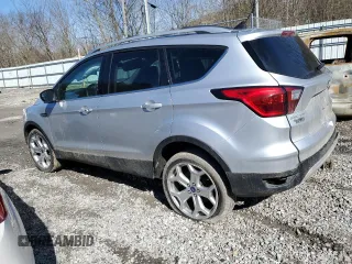 2019 Ford Escape Titanium with VIN 1FMCU9J98KUB53669, listed as a Copart auction lot 47344715 with 84,051 mi miles and Salvage title. Bid and sale history available at DreamBid. Image 2.