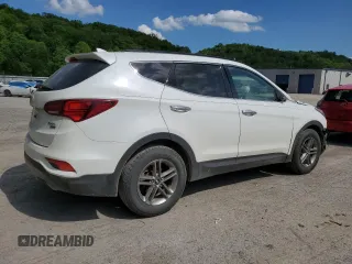 2017 Hyundai Santa Fe 2.4L z VIN 5XYZUDLB7HG388382, wystawiony jako Copart lot #57167315 z przebiegiem 128 724 mil mil oraz Szkoda całkowita • Salvage title. Historia ofert i sprzedaży dostępna na DreamBid. Obrazek 3.