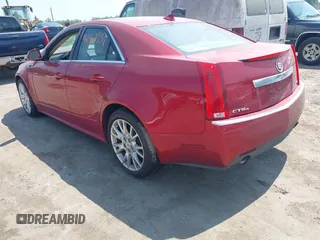 2012 Cadillac CTS Premium with VIN 1G6DS5E34C0132696, listed as a IAAI auction lot 42562931 with 83,025 mi miles and . Bid and sale history available at DreamBid. Image 3.