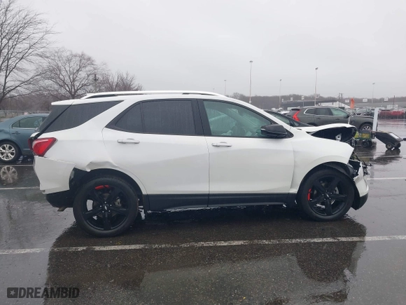 2021 Chevrolet Equinox Premier with VIN 2GNAXNEV7M6112087, listed as a IAAI auction lot 41102702 with 32,995 mi miles. Bid and sale history available at carsss.com. Image 13.