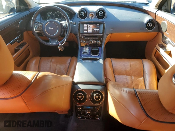 2013 Jaguar XJ with VIN SAJWA2G16DLV50973, listed as a Copart auction lot 82555074 with 148,956 mi miles and Salvage Title. Bid and sale history available at carsss.com. Image 8.