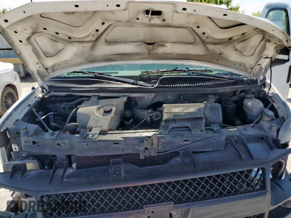 2007 Chevrolet Express Cargo z VIN 1GCFG15X871251452, wystawiony jako Copart lot #60542685 z przebiegiem 278 825 mil mil oraz Szkoda całkowita • Salvage title. Historia ofert i sprzedaży dostępna na DreamBid. Obrazek 12.
