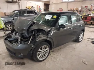 2012 MINI Countryman S with VIN WMWZC3C59CWL83491, listed as a IAAI auction lot 41791573 with 115,355 mi miles and . Bid and sale history available at DreamBid. Image 18.