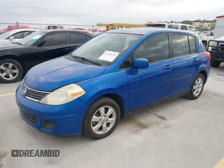 2009 Nissan Versa 1.8 SL with VIN 3N1BC13E89L350489, listed as a IAAI auction lot 42048145 with 166,079 mi miles. Bid and sale history available at carsss.com. Image 2.