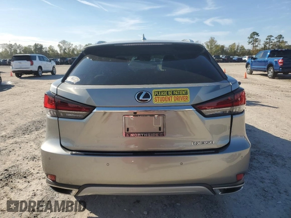 2022 Lexus RX with VIN 2T2JZMAA8NC256470, listed as a Copart auction lot 82873304 with 14,614 mi miles and Salvage Title. Bid and sale history available at carsss.com. Image 6.