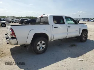 2014 Toyota Tacoma with VIN 5TFLU4EN8EX097721, listed as a Copart auction lot 54512555 with Not Provided miles and Non Repairable. Bid and sale history available at DreamBid. Image 3.