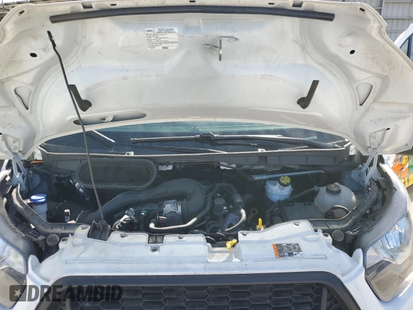 2023 Ford Transit Cargo with VIN 1FTBR1Y88PKA97221, listed as a Copart auction lot 43410475 with 34,927 mi miles and Salvage Title. Bid and sale history available at DreamBid. Image 12.