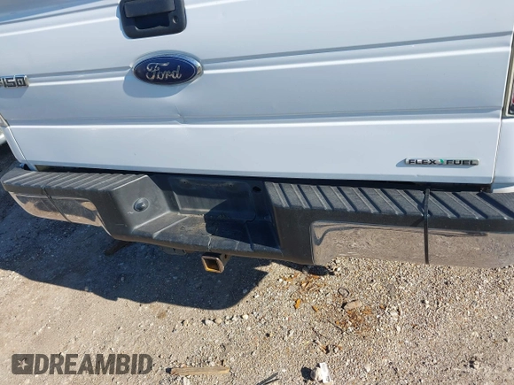 2014 Ford F-150 XL with VIN 1FTFW1EF9EKF06661, listed as a IAAI auction lot 42235635 with 327,584 mi miles and . Bid and sale history available at DreamBid. Image 6.
