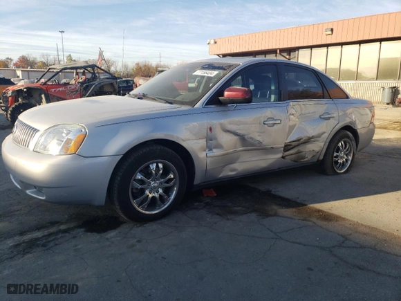 2005 Mercury Montego Premier with VIN 1MEFM43165G608323, listed as a Copart auction lot 77156404 with 138,150 mi miles and Salvage Title. Bid and sale history available at carsss.com. Image 1.