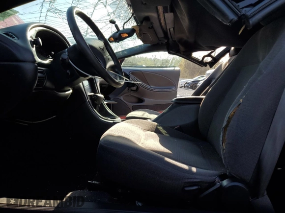 2000 Ford Mustang z VIN 1FAFP4449YF281935, wystawiony jako Copart lot #49970805 z przebiegiem 248 106 mil mil oraz Szkoda całkowita • Salvage title. Historia ofert i sprzedaży dostępna na DreamBid. Obrazek 7.