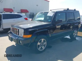 2007 Jeep Commander Sport z VIN 1J8HH48P97C619556, wystawiony jako IAAI lot #42343720 z przebiegiem 152 647 mil mil oraz . Historia ofert i sprzedaży dostępna na DreamBid. Obrazek 2.