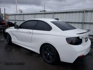 2017 BMW 2 Series M240i xDrive with VIN WBA2G3C30HV641463, listed as a Copart auction lot 77101614 with 76,571 mi miles and Salvage Title. Bid and sale history available at carsss.com. Image 2.