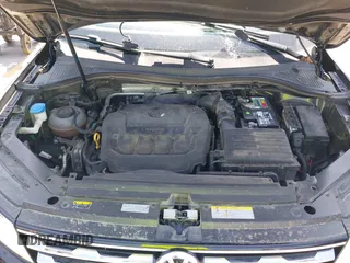 2021 Volkswagen Tiguan S with VIN 3VV1B7AX9MM067347, listed as a IAAI auction lot 42305101 with 77,042 mi miles and . Bid and sale history available at DreamBid. Image 10.