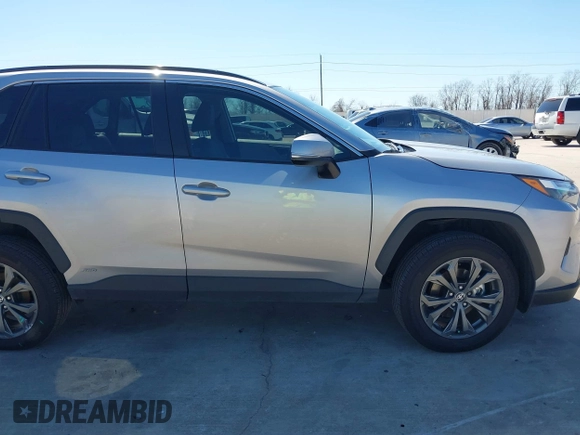2023 Toyota RAV4 Hybrid XLE Premium z VIN 4T3B6RFV6PU139151, wystawiony jako IAAI lot #41665860 z przebiegiem 7 171 mil mil oraz . Historia ofert i sprzedaży dostępna na DreamBid. Obrazek 14.