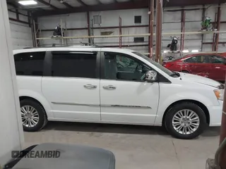 2014 Chrysler Town & Country Limited with VIN 2C4RC1GG7ER178802, listed as a IAAI auction lot 41863918 with 103,777 mi miles and . Bid and sale history available at DreamBid. Image 14.