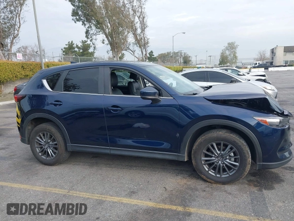 2019 Mazda CX-5 Touring with VIN JM3KFACM5K0697137, listed as a IAAI auction lot 41720253 with 50,416 mi miles. Bid and sale history available at carsss.com. Image 13.