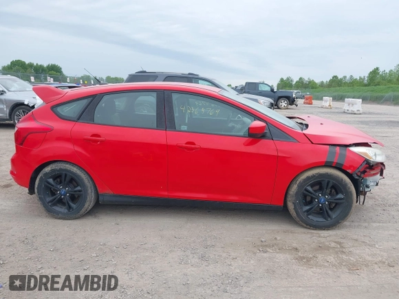 2012 Ford Focus SE z VIN 1FAHP3K23CL152488, wystawiony jako IAAI lot #42365769 z przebiegiem 185 763 mil mil oraz . Historia ofert i sprzedaży dostępna na DreamBid. Obrazek 14.