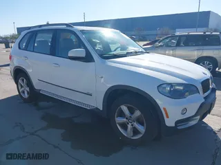 2007 BMW X5 3.0si with VIN 5UXFE43567LY82907, listed as a IAAI auction lot 41499356 with 117,173 mi miles. Bid and sale history available at carsss.com. Image 1.