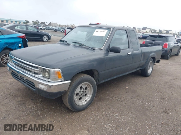 1990 Toyota Pickup z VIN JT4VN93D7L5014236, wystawiony jako IAAI lot #41776761 z przebiegiem Nie podano mil oraz . Historia ofert i sprzedaży dostępna na DreamBid. Obrazek 2.