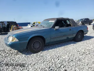 1993 Ford Mustang z VIN 1FACP44MXPF128112, wystawiony jako Copart lot #54756785 z przebiegiem 92 587 mil mil oraz Tytuł czysty. Historia ofert i sprzedaży dostępna na DreamBid. Obrazek 1.
