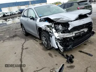 2024 Honda HR-V EX-L z VIN 3CZRZ2H79RM711744, wystawiony jako Copart lot #55911985 z przebiegiem 8 261 mil mil oraz Szkoda całkowita • Salvage title. Historia ofert i sprzedaży dostępna na DreamBid. Obrazek 14.