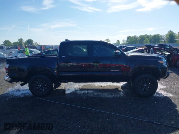2023 Toyota Tacoma SR5 z VIN 3TYAZ5CN5PT036387, wystawiony jako IAAI lot #42077284 z przebiegiem 34 568 mil mil oraz . Historia ofert i sprzedaży dostępna na DreamBid. Obrazek 13.
