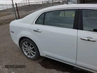 2009 Chevrolet Malibu LTZ with VIN 1G1ZK57719F109877, listed as a IAAI auction lot 41745297 with 151,862 mi miles and . Bid and sale history available at DreamBid. Image 6.