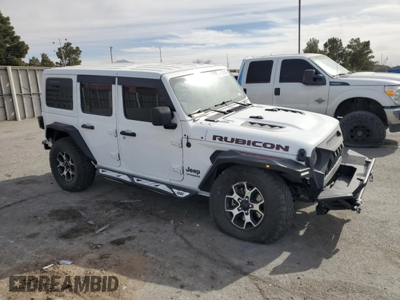 2021 Jeep Wrangler Unlimited Rubicon with VIN 1C4JJXFM6MW818162, listed as a Copart auction lot 42187885 with 34,273 mi miles and Salvage Title. Bid and sale history available at carsss.com. Image 4.