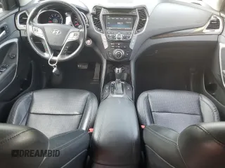 2014 Hyundai Santa Fe z VIN 5XYZW3LA0EG153782, wystawiony jako Copart lot #62542125 z przebiegiem 201 828 mil mil oraz Szkoda całkowita • Salvage title. Historia ofert i sprzedaży dostępna na DreamBid. Obrazek 8.