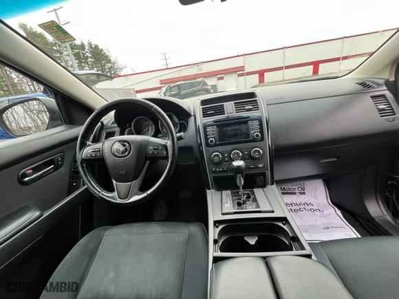 2015 Mazda CX-9 Sport with VIN JM3TB3BV5F0462202, listed as a Copart auction lot 85791824 with 131,284 mi miles and Clean Title. Bid and sale history available at carsss.com. Image 9.