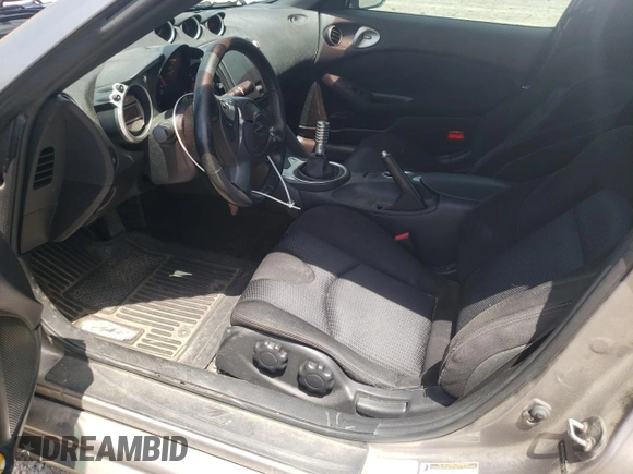 2009 Nissan 370Z Touring with VIN JN1AZ44E49M402605, listed as a Copart auction lot 55972355 with 157,066 mi miles and Clean Title. Bid and sale history available at DreamBid. Image 7.