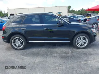 2017 Audi Q5 Premium Plus z VIN WA1L2AFP3HA041885, wystawiony jako IAAI lot #42357486 z przebiegiem 100 434 mil mil oraz . Historia ofert i sprzedaży dostępna na DreamBid. Obrazek 13.