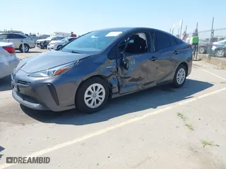 2022 Toyota Prius L Eco with VIN JTDKAMFU5N3160694, listed as a IAAI auction lot 41874909 with 80,376 mi miles. Bid and sale history available at carsss.com. Image 17.