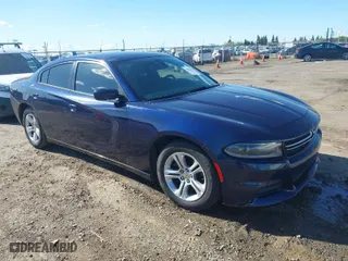 2015 Dodge Charger SE with VIN 2C3CDXBG0FH772236, listed as a IAAI auction lot 41928102 with 223,520 mi miles. Bid and sale history available at carsss.com. Image 1.