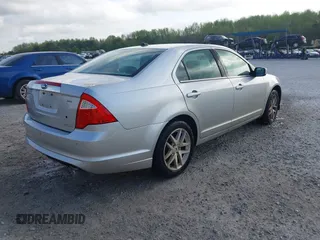 2012 Ford Fusion SEL with VIN 3FAHP0JG3CR221984, listed as a IAAI auction lot 41970437 with 142,264 mi miles. Bid and sale history available at carsss.com. Image 4.