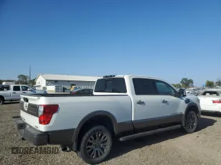 2017 Nissan Titan XD PRO-4X with VIN 1N6BA1F44HN541022, listed as a Copart auction lot 73966134 with 66,582 mi miles and Salvage Title. Bid and sale history available at carsss.com. Image 3.