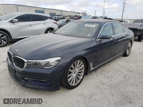 2017 BMW 7 Series 740i xDrive with VIN WBA7E4C5XHGU99064, listed as a Copart auction lot 70792133 with 122,264 mi miles. Bid and sale history available at carsss.com. Image 1.