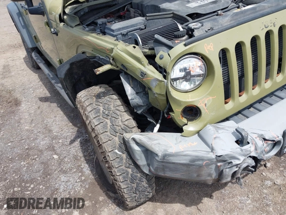 2013 Jeep Wrangler Unlimited Sport z VIN 1C4BJWDG0DL577812, wystawiony jako IAAI lot #42301104 z przebiegiem 138 387 mil mil oraz . Historia ofert i sprzedaży dostępna na DreamBid. Obrazek 6.