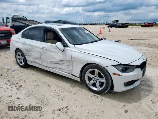 2015 BMW 3 Series 328i with VIN WBA3A5G57FNP34958, listed as a Copart auction lot 58589225 with 136,422 mi miles and Salvage title. Bid and sale history available at DreamBid. Image 4.