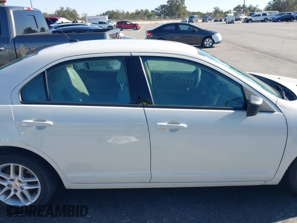 2012 Ford Fusion S with VIN 3FAHP0GA7CR364584, listed as a IAAI auction lot 41664045 with 185,895 mi miles. Bid and sale history available at carsss.com. Image 13.
