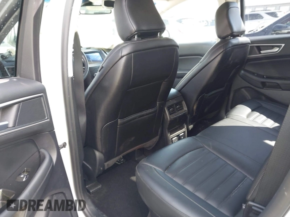 2020 Ford Edge SEL z VIN 2FMPK4J9XLBA07663, wystawiony jako IAAI lot #42115904 z przebiegiem 45 385 mil mil oraz . Historia ofert i sprzedaży dostępna na DreamBid. Obrazek 8.