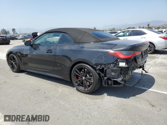 2022 BMW 4 Series M440i with VIN WBA53AT01NCJ52404, listed as a Copart auction lot 54464474 with 16,880 mi miles and Salvage title. Bid and sale history available at DreamBid. Image 2.