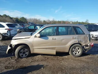 2008 Suzuki Grand Vitara with VIN JS3TE941884102058, listed as a IAAI auction lot 41433513 with 299,533 mi miles and . Bid and sale history available at DreamBid. Image 13.
