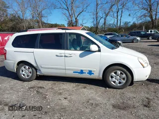 2009 Kia Sedona LX with VIN KNDMB233096312990, listed as a IAAI auction lot 41261428 with 254,323 mi miles. Bid and sale history available at carsss.com. Image 13.