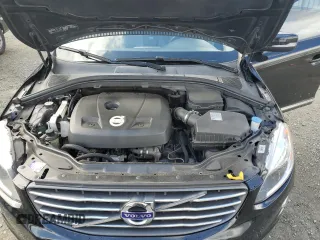 2015 Volvo XC60 T5 Drive-E z VIN YV440MDJ2F2686581, wystawiony jako Copart lot #57689395 z przebiegiem 147 104 mil mil oraz Szkoda całkowita • Salvage title. Historia ofert i sprzedaży dostępna na DreamBid. Obrazek 12.